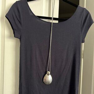 Complete top outfit with top, scarf, purse and necklace